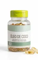 Frasco transparente de Suplemento de Óleo de Coco Extra Virgem Prensado a Frio com 60 cápsulas e tampa verde. O rótulo é branco com detalhes em verde claro, e há algumas cápsulas gelatinosas douradas soltas ao lado do pote, sobre um fundo branco.